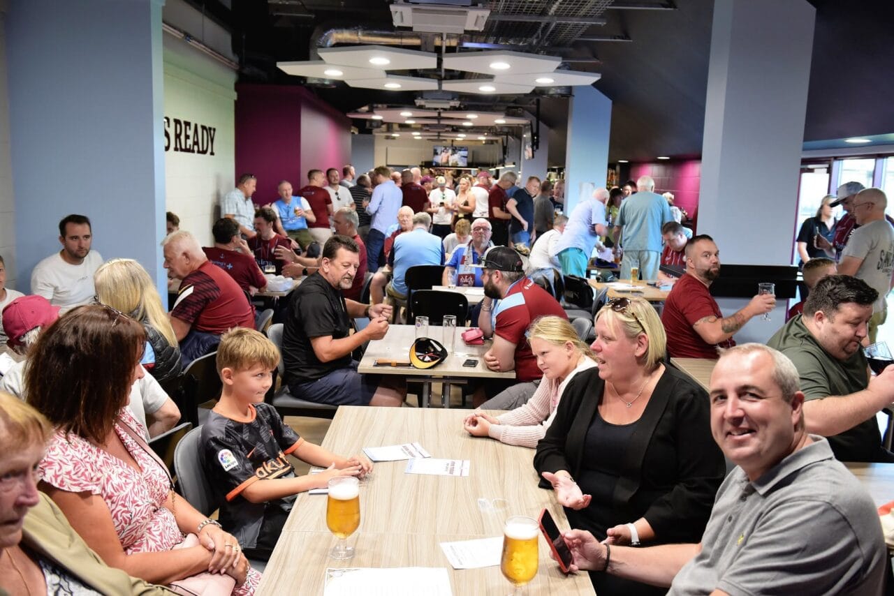 Busy room with people having drinks in 1888 Bar at SSFC.